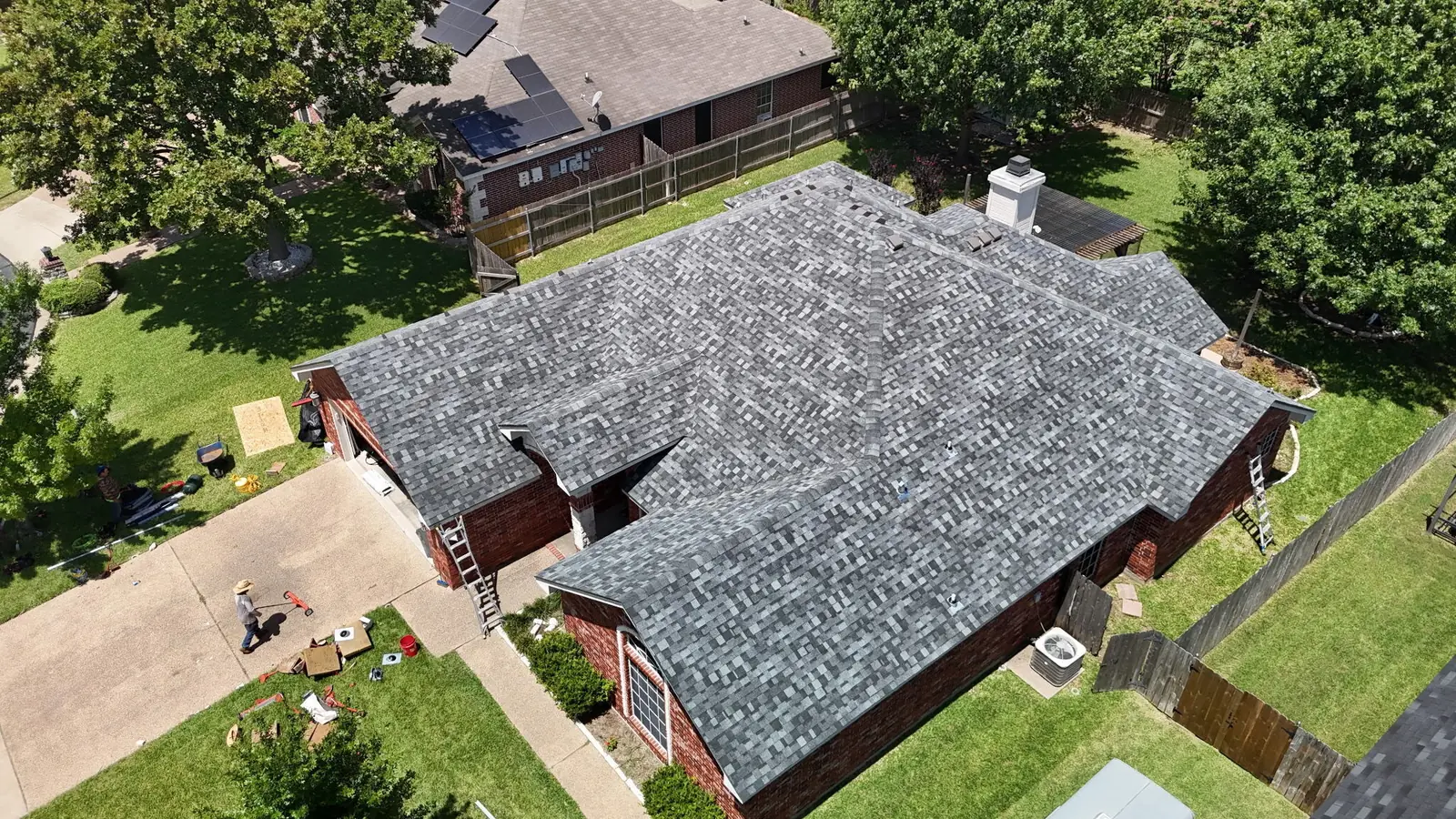A completed shingle roof replacement on a Waco home, seen from above
