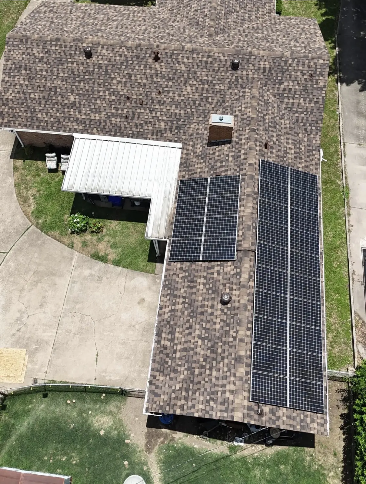 A Waco home with roof mounted solar panels, seen from above