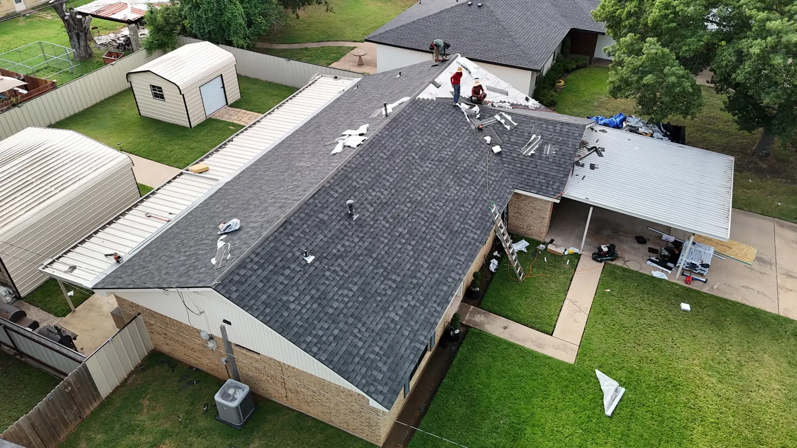 ACS crew working on a residential roof in Waco, seen from above
