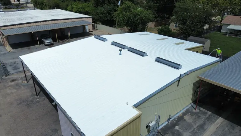 Coated low slope commercial roof in Waco, from above