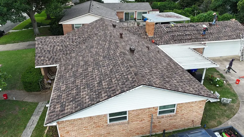 A weathered roof photographed from above before replacement